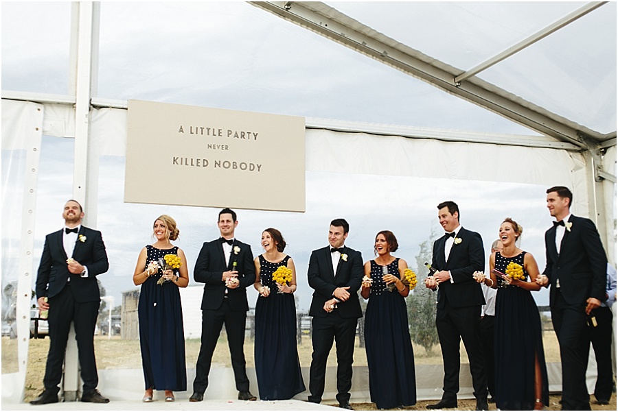 Large bridal party at reception