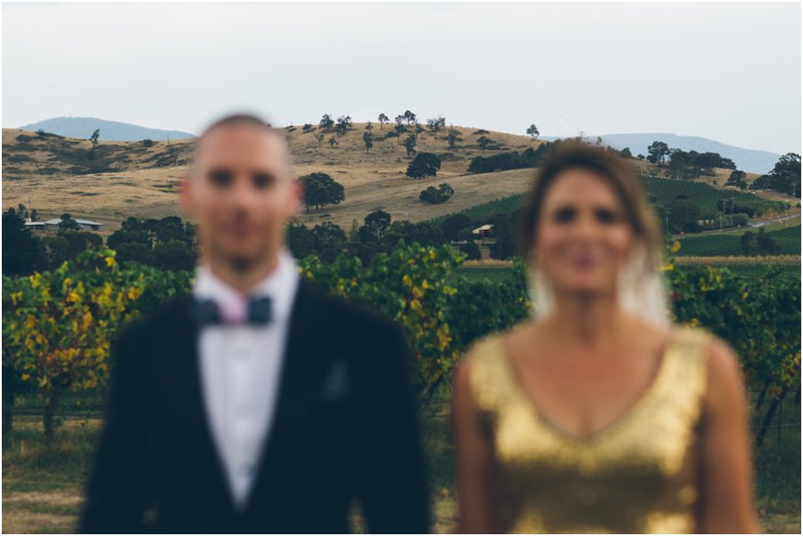Yarra Valley wedding venues - Bride & groom in foreground with the stunning backdrop in focus