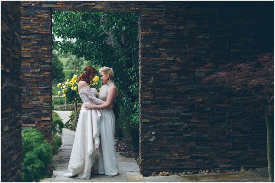 Yarra Valley wedding venues - Lesbian couple in archway at Balgownie Estate
