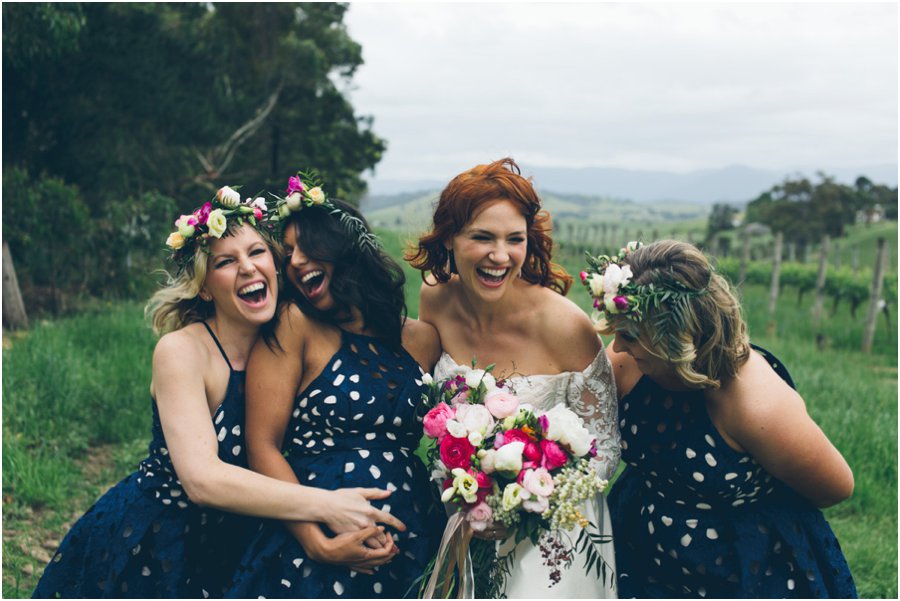 Yarra Valley wedding venues - Bride and bridesmaids laughing at Balgownie Estate