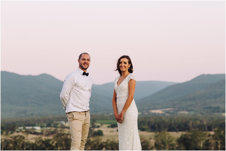 Yarra Valley wedding venues - Sunset shot of a couple with stunning mountains in backdrop