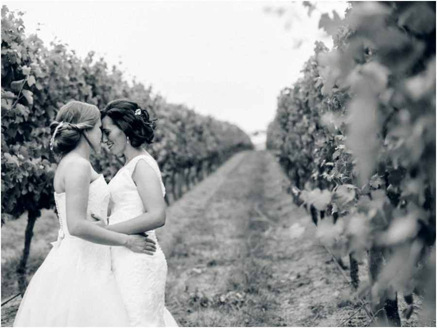 Yarra Valley wedding venues - Two brides, one kissing the others forehead