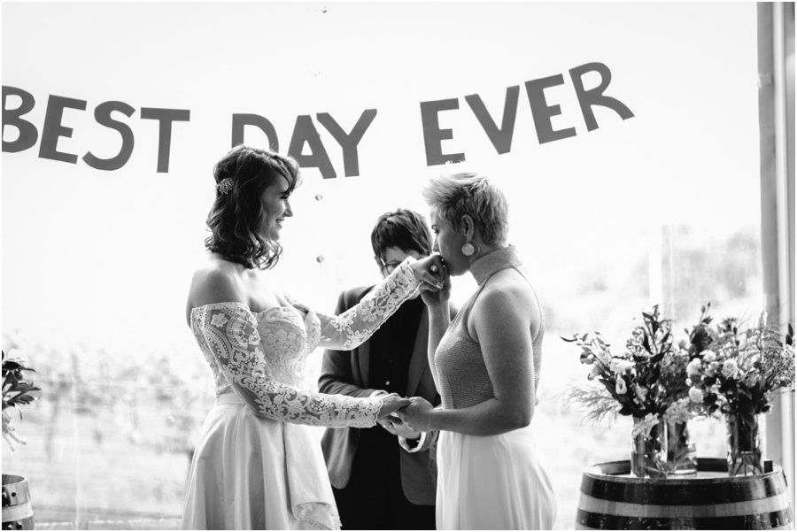 LJM Photography LGBTQI wedding couple kissing a hand