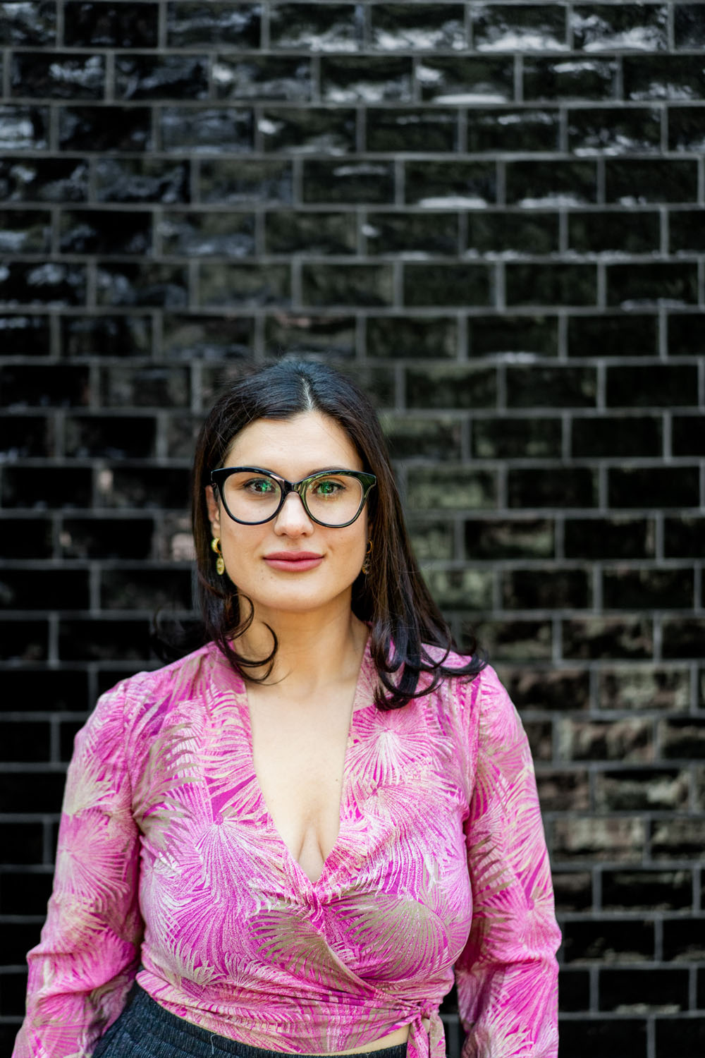 Professional Melbourne headshot against black brick wall