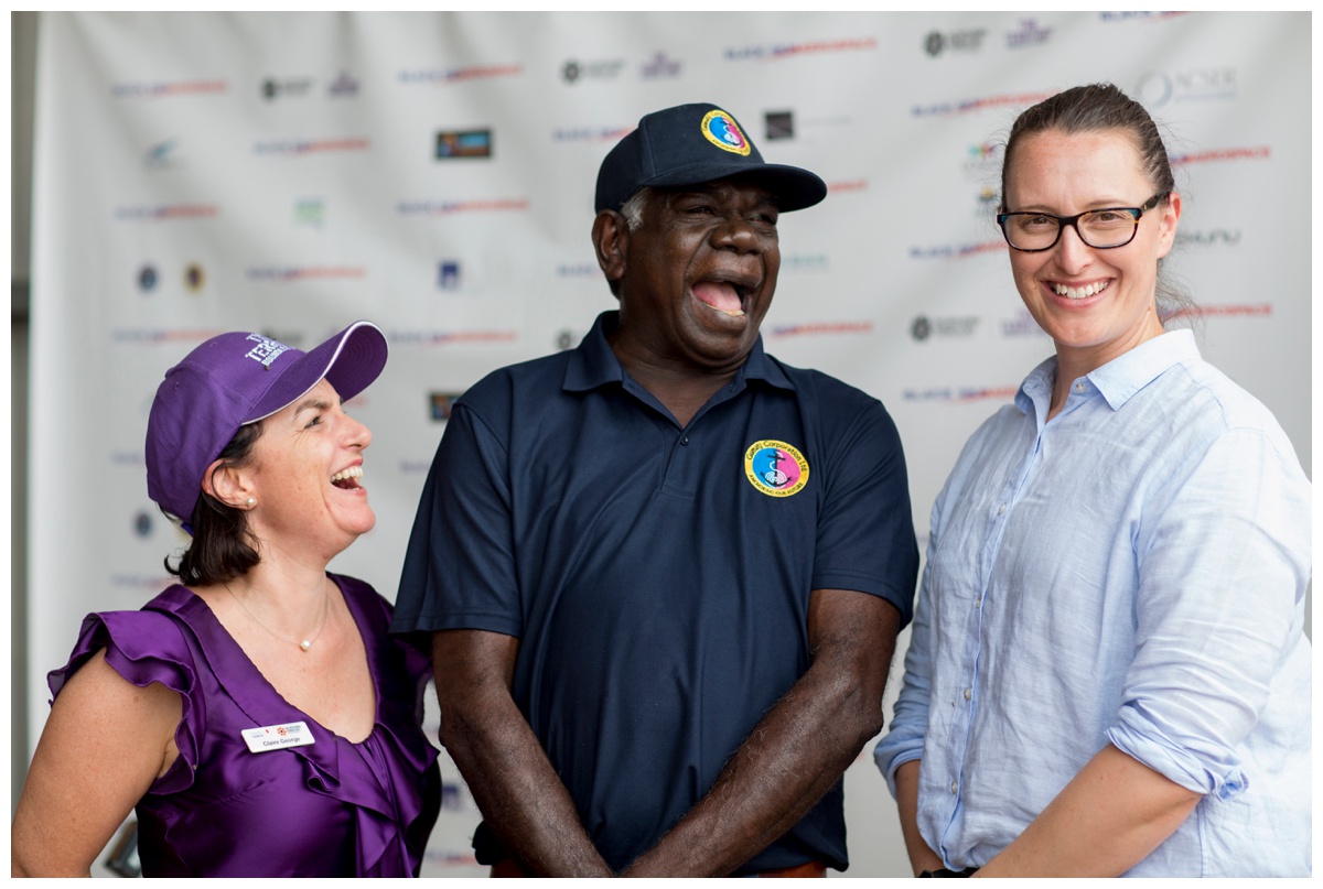 Portrait of three people laughing