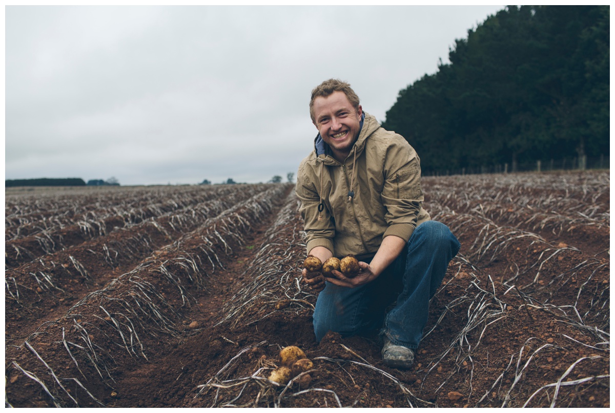 Potato farmer with his product