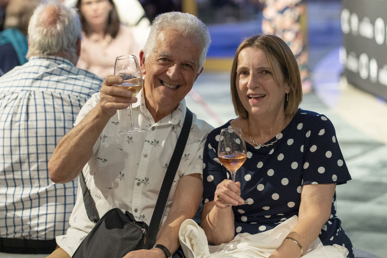 Audience members enjoying drinks and smiling before Circa’s Duck Pond performance at The Round, Melbourne.