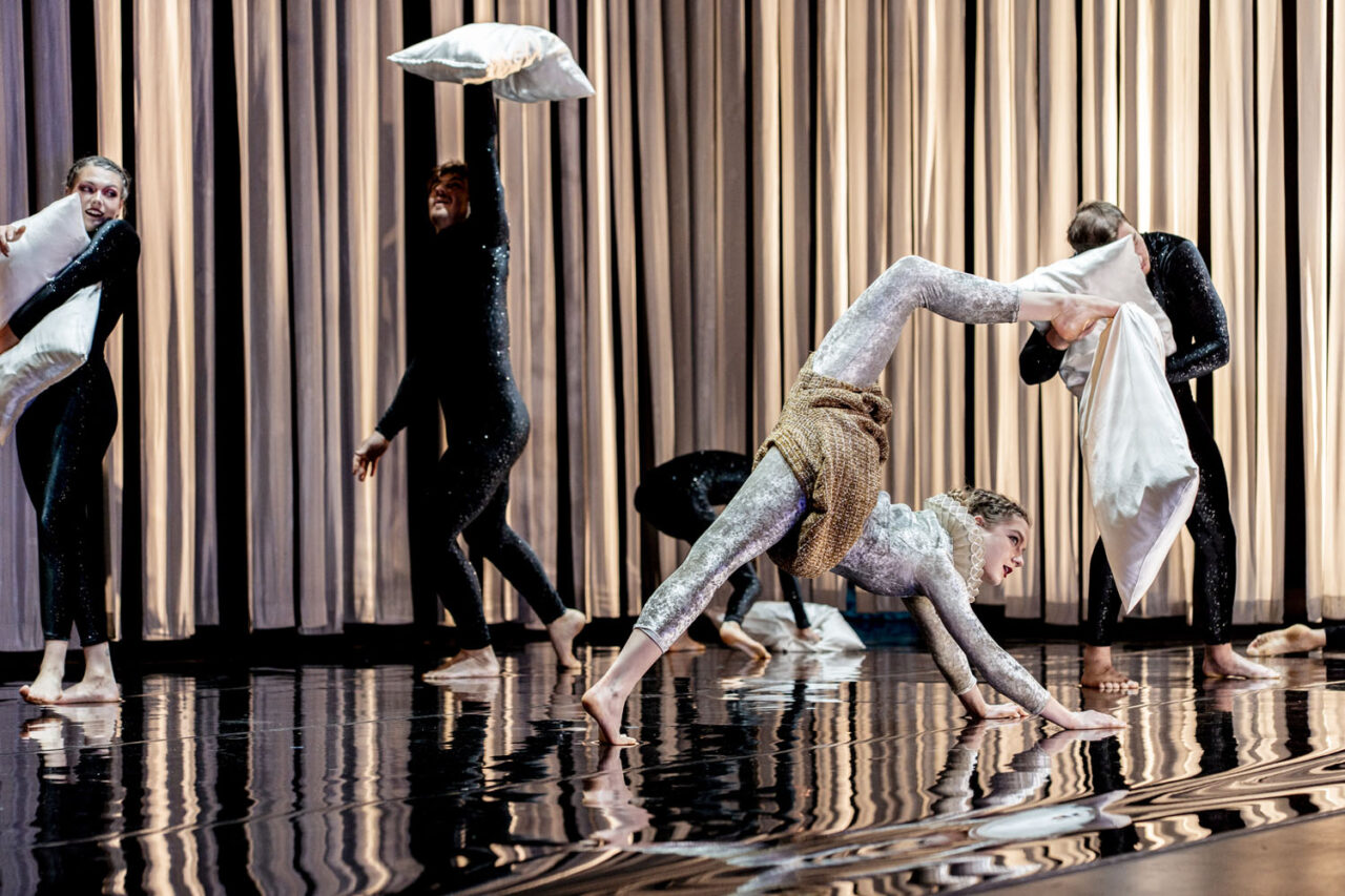 Performers mid-movement in Circa’s Duck Pond pillow-fight sequence at The Round Melbourne, photographed by Lauren Marshall.