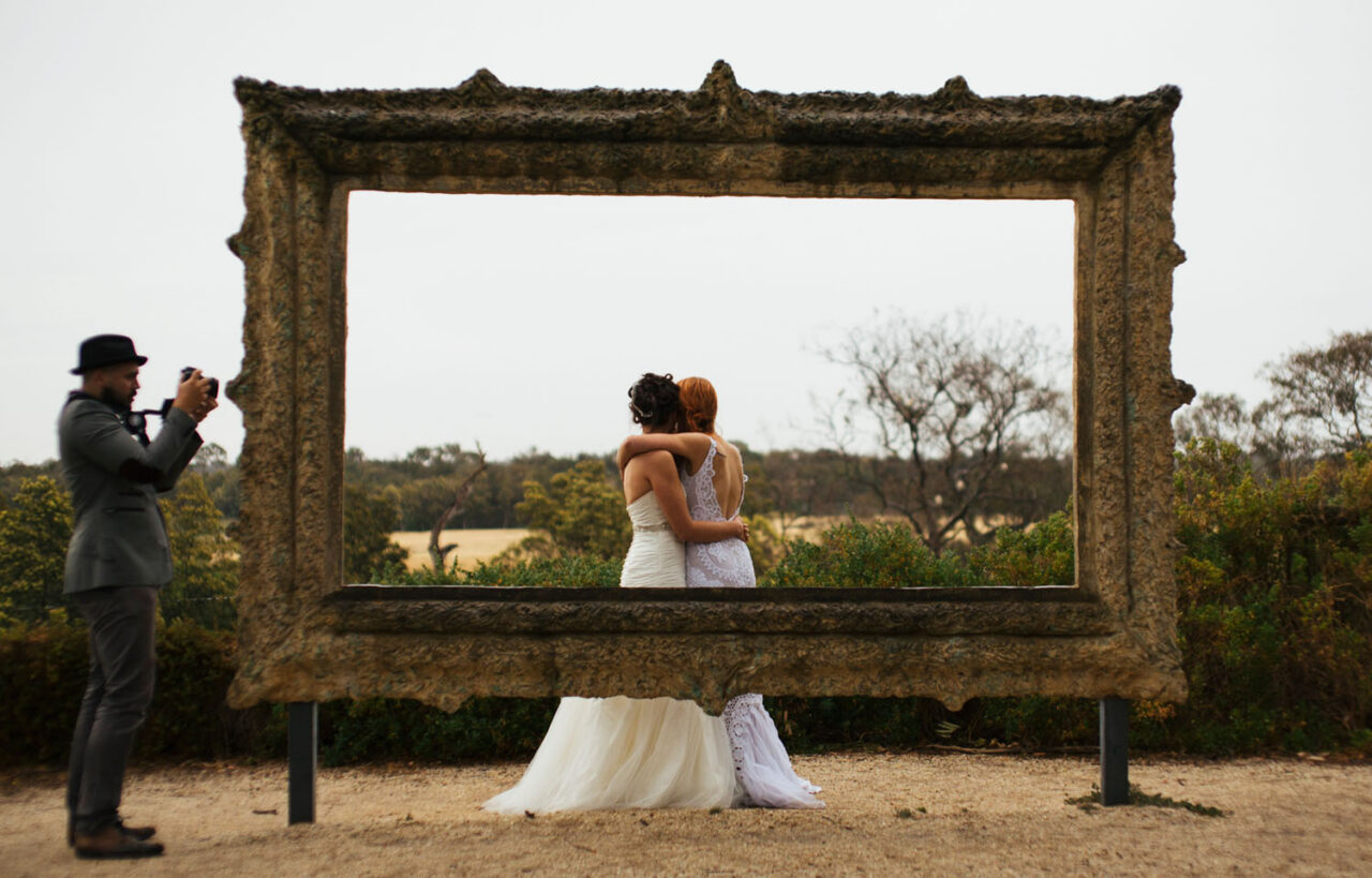 queer-wedding-couple-framed-sculpture-landscape-victoria-ryan-lee-adams-videographer