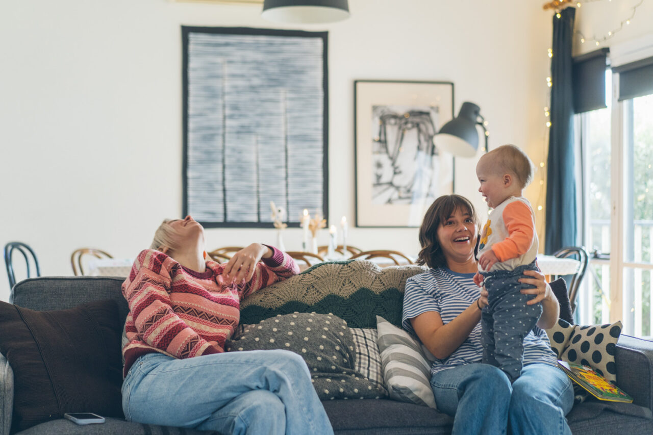 Playful candid moment inside an Airbnb during a relaxed queer elopement in Daylesford.